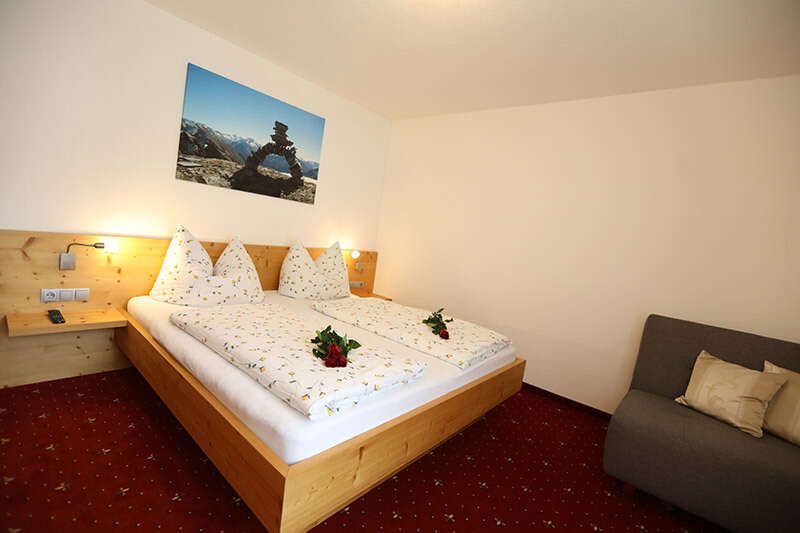 Room with double bed in Haus Maria in Gerlos