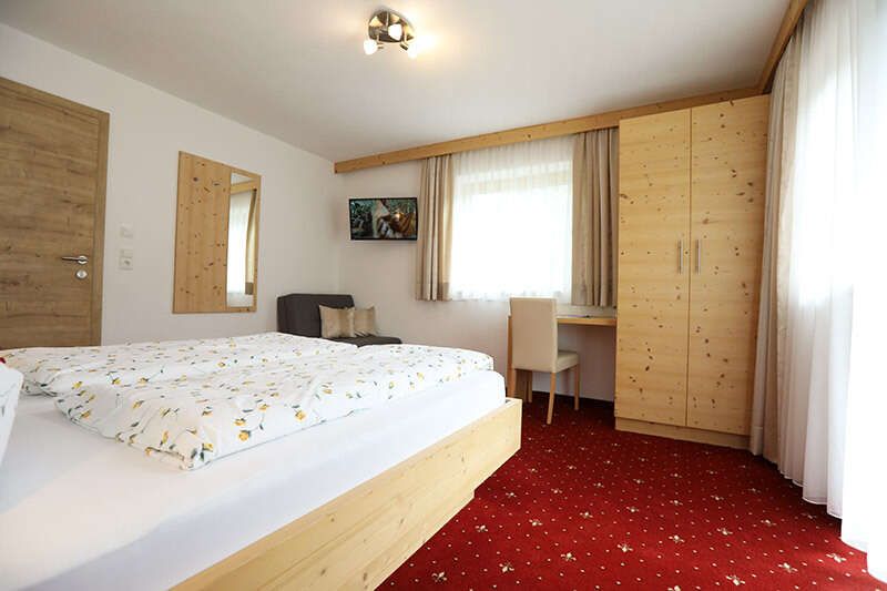 Room with double bed in Haus Maria in Gerlos