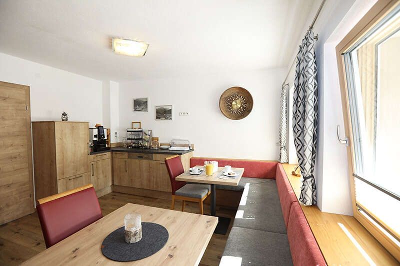 Breakfast and lounge room in Haus Maria im Zillertal